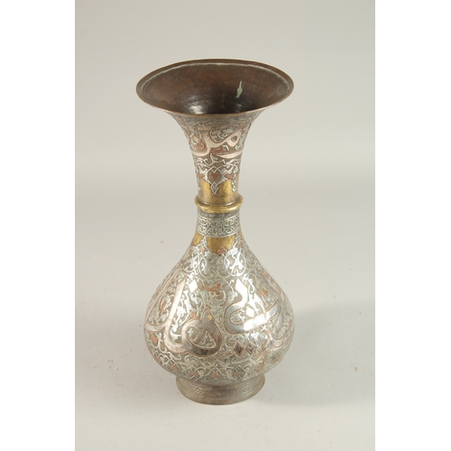 265 - A FINE 19TH CENTURY SYRIAN SILVER AND COPPER INLAID BRASS VASE, with large bands of calligraphy, 36c... 