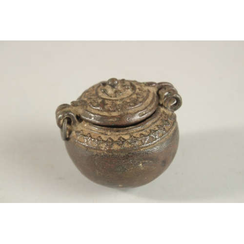 269 - A 17TH-18TH CENTURY BRONZE MONEY BOX, 6cm high.