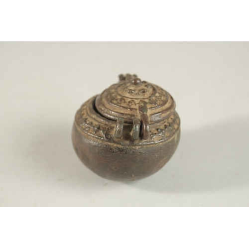 269 - A 17TH-18TH CENTURY BRONZE MONEY BOX, 6cm high.