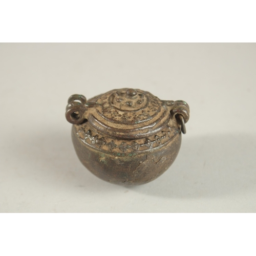 269 - A 17TH-18TH CENTURY BRONZE MONEY BOX, 6cm high.