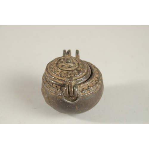 269 - A 17TH-18TH CENTURY BRONZE MONEY BOX, 6cm high.