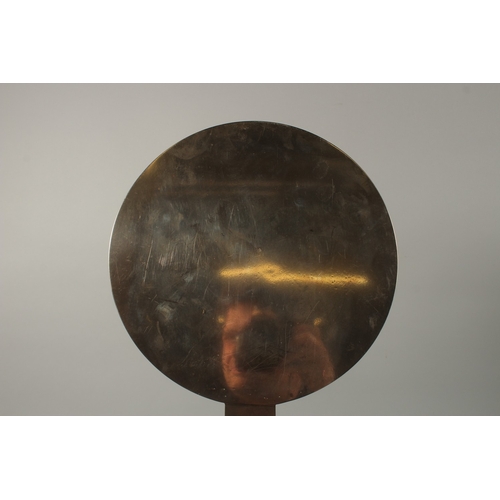 28 - A CHINESE MIRROR, with large central character.