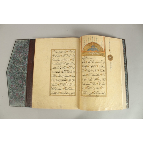 280 - A FINE 17TH CENTURY OTTOMAN LEATHER BOUND QURAN JUZ SECTION, with beautifully gilded illuminated sur... 