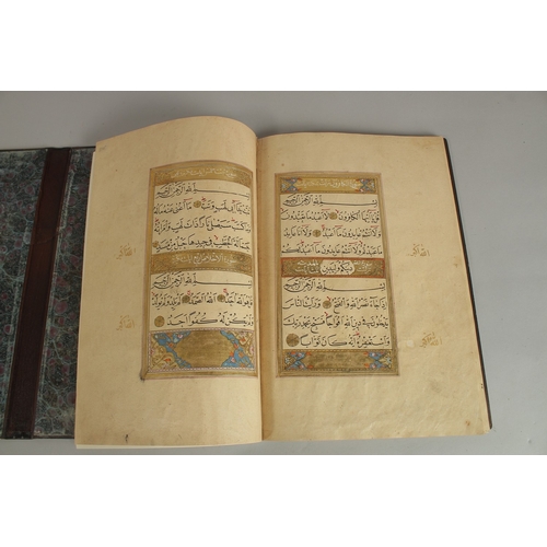 280 - A FINE 17TH CENTURY OTTOMAN LEATHER BOUND QURAN JUZ SECTION, with beautifully gilded illuminated sur... 