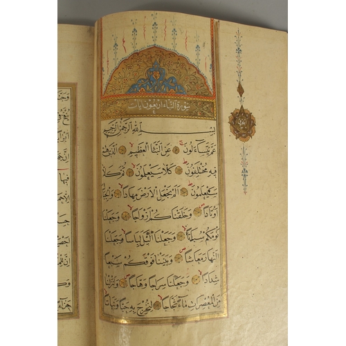 280 - A FINE 17TH CENTURY OTTOMAN LEATHER BOUND QURAN JUZ SECTION, with beautifully gilded illuminated sur... 