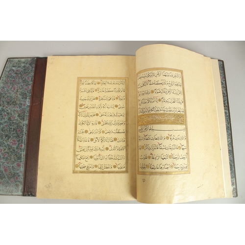 280 - A FINE 17TH CENTURY OTTOMAN LEATHER BOUND QURAN JUZ SECTION, with beautifully gilded illuminated sur... 