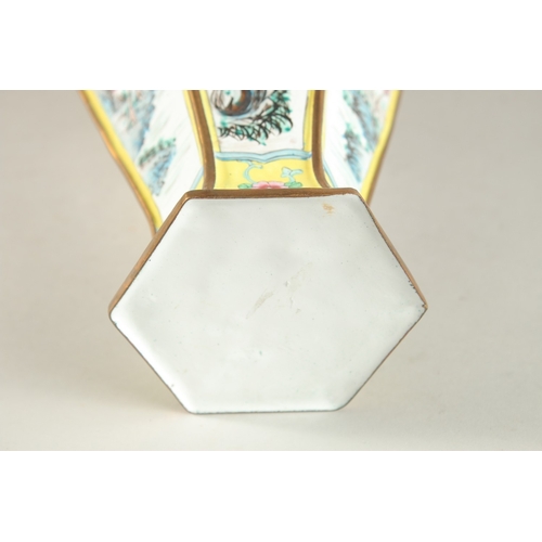 286 - A CHINESE CANTON YELLOW GROUND ENAMELLED HEXAGONAL VASE, 33cm high.