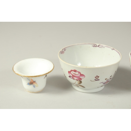 294 - A COLLECTION OF CHINESE PORCELAIN ITEMS, comprising two tea bowls, two tea cups, two small candle ho... 