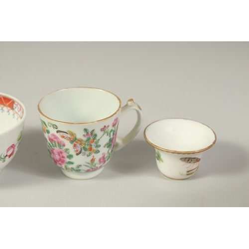 294 - A COLLECTION OF CHINESE PORCELAIN ITEMS, comprising two tea bowls, two tea cups, two small candle ho... 