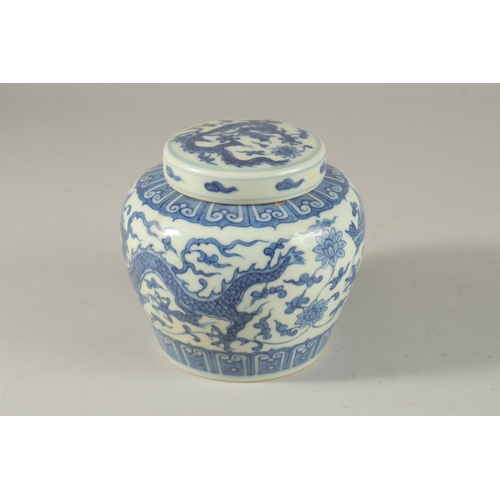 305 - A CHINESE BLUE AND WHITE PORCELAIN DRAGON JAR AND COVER, 12cm high.