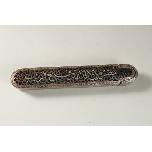 320 - AN ISLAMIC OPENWORK STEEL PEN BOX, the top with silvered calligraphy inscription, 23cm long.