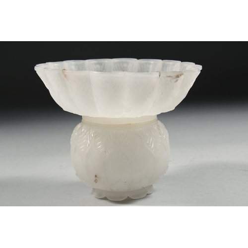 321 - AN 18TH CENTURY INDIAN MUGHAL CARVED WHITE JADE LIDDED BOWL, carved with foliate motifs and petal fo... 