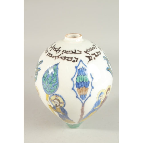 323 - A TURKISH ARMENIAN GLAZED POTTERY BALL ORNAMENT, 20cm high.