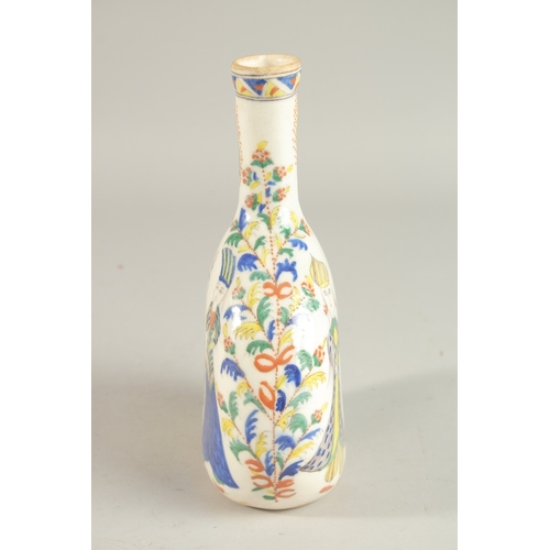 325 - A TURKISH KUTAHYA GLAZED POTTERY BOTTLE, painted with figures, 22cm high.