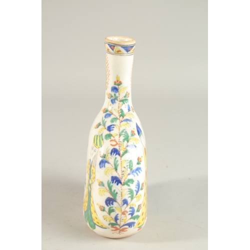 325 - A TURKISH KUTAHYA GLAZED POTTERY BOTTLE, painted with figures, 22cm high.