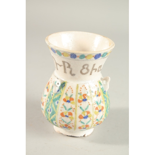 326 - A SMALL TURKISH ARMENIAN GLAZED POTTERY MOSQUE LAMP, 13cm high.