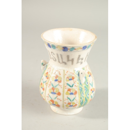 326 - A SMALL TURKISH ARMENIAN GLAZED POTTERY MOSQUE LAMP, 13cm high.