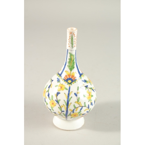 327 - A TURKISH KUTAHYA GLAZED POTTERY ROSEWATER SPRINKLER, 16.5cm high.