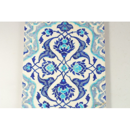 330 - A LARGE TURKISH IZNIK GLAZED POTTERY TILE, 32.5cm x 26.5cm.