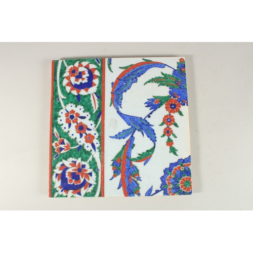 331 - A LARGE TURKISH IZNIK GLAZED POTTERY TILE, 27cm square.