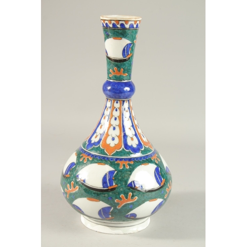 332 - A TURKISH IZNIK GLAZED POTTERY VASE, 33cm high.