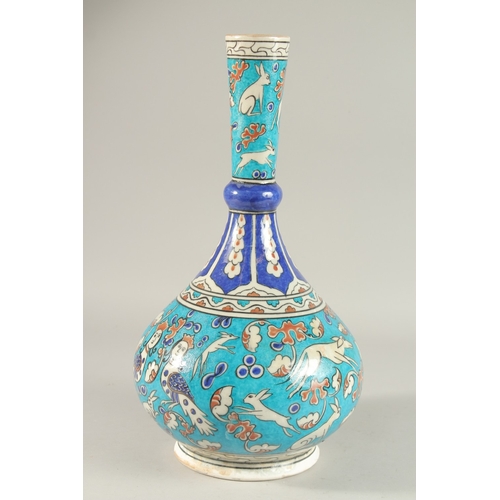 333 - A LARGE TURKISH IZNIK GLAZED POTTERY VASE, painted with harpies and animals, 40cm high.