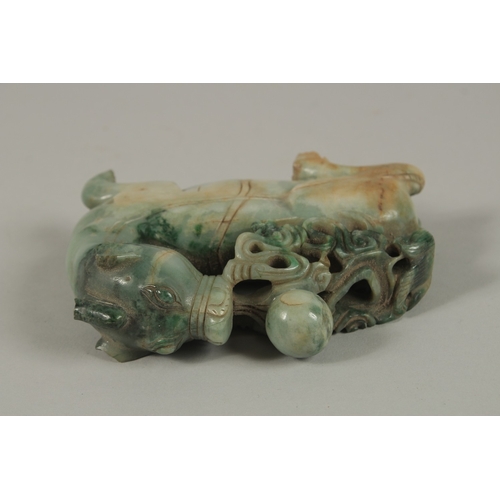 34 - A CHINESE CARVED JADE FIGURE OF A BULL, 13cm long.