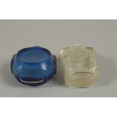 45 - A CHINESE REVERSE GLASS PAINTED SNUFF BOTTLE, together with a blue glass bottle, (2).