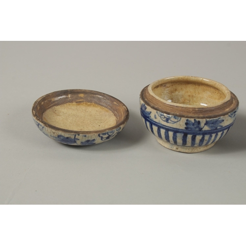 5 - A PAIR OF CHINESE BLUE AND WHITE PORCELAIN CIRCULAR BOXES AND COVERS, together with a small bowl, (3... 