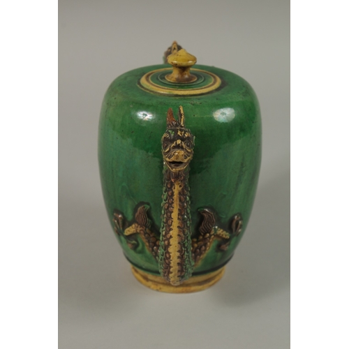 52 - A FINE CHINESE GREEN AND YELLOW GLAZED TEAPOT OR WATER DROPPER, with dragon formed handle and spout,... 