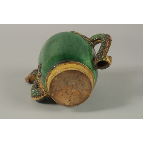 52 - A FINE CHINESE GREEN AND YELLOW GLAZED TEAPOT OR WATER DROPPER, with dragon formed handle and spout,... 