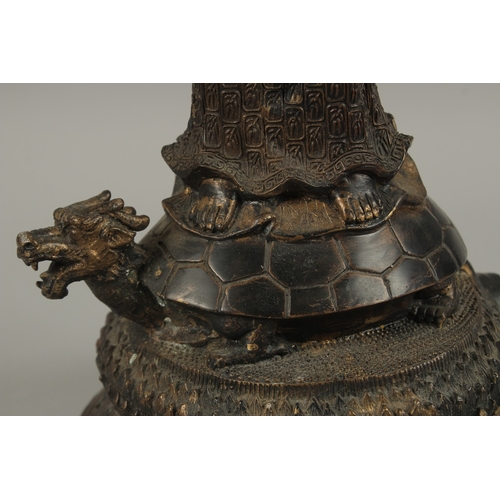 56 - A FINE AND LARGE CHINESE BRONZE FIGURE OF GUANYIN, stood upon a mythical turtle on a circular lotus ... 