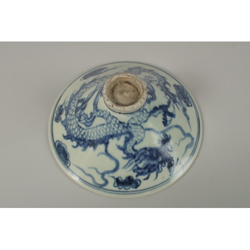 6 - A CHINESE BLUE AND WHITE PORCELAIN DRAGON BOWL, 16cm diameter.