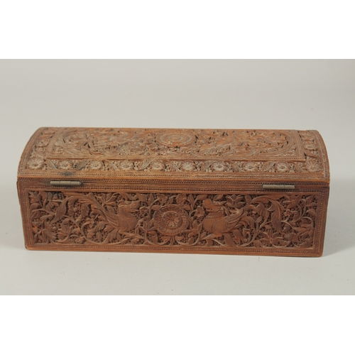 62 - A VERY FINE THAI OR INDIAN CARVED WOOD RECTANGULAR BOX, with mythical creatures and fine foliate car... 