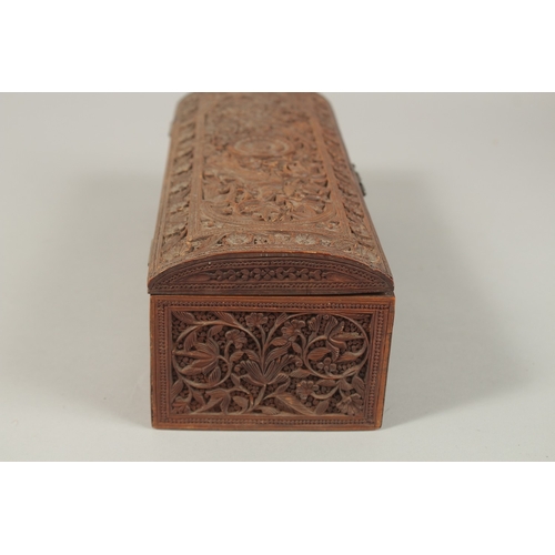 62 - A VERY FINE THAI OR INDIAN CARVED WOOD RECTANGULAR BOX, with mythical creatures and fine foliate car... 