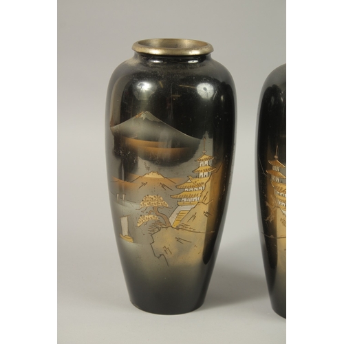 64 - A PAIR OF JAPANESE MIXED METAL VASES, 24cm high, together with a cylindrical vase with relief decora... 