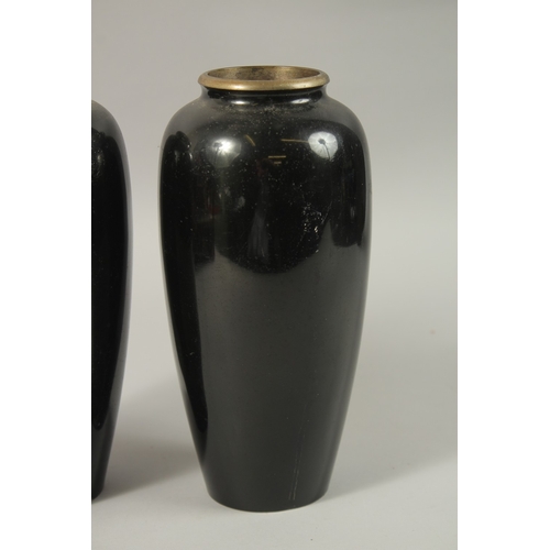 64 - A PAIR OF JAPANESE MIXED METAL VASES, 24cm high, together with a cylindrical vase with relief decora... 