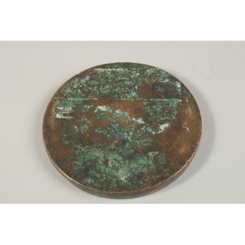 68 - A CHINESE CIRCULAR BRONZE MIRROR, 8.5cm diameter.