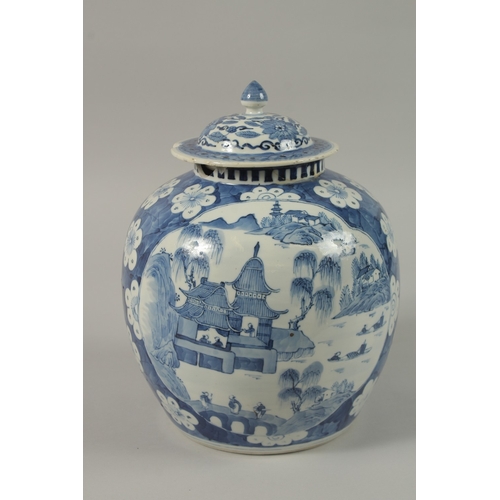 7 - A CHINESE BLUE AND WHITE PORCELAIN GINGER JAR AND COVER, the base with six-character mark, 28cm high... 