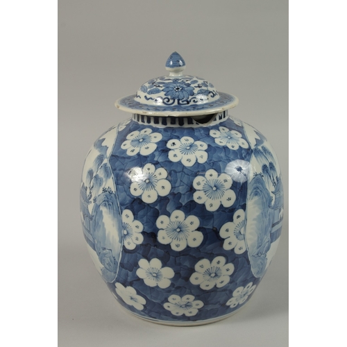 7 - A CHINESE BLUE AND WHITE PORCELAIN GINGER JAR AND COVER, the base with six-character mark, 28cm high... 