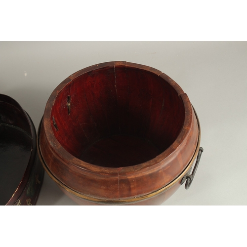 73 - A CHINESE WOODEN BARREL RICE BOX, with mounted metal handles, together with another lacquered box, (... 