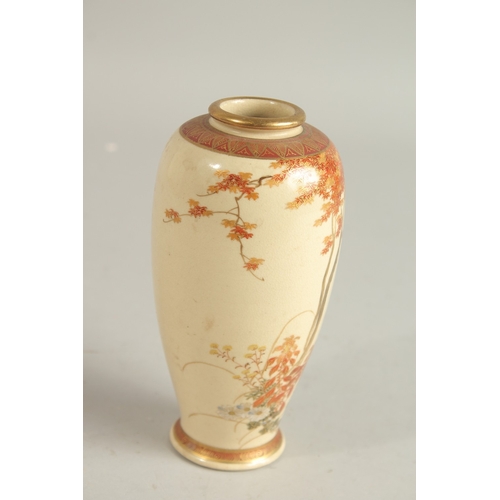 83 - A JAPANESE SATSUMA VASE, painted with flora and fine gilt highlights, signed to base, 15.5cm high.