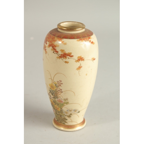 83 - A JAPANESE SATSUMA VASE, painted with flora and fine gilt highlights, signed to base, 15.5cm high.