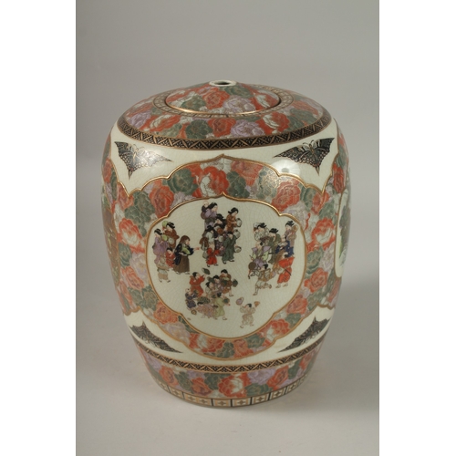 85 - A LARGE JAPANESE SATSUMA JAR AND COVER, painted with panels of figures and landscape scenes with gil... 