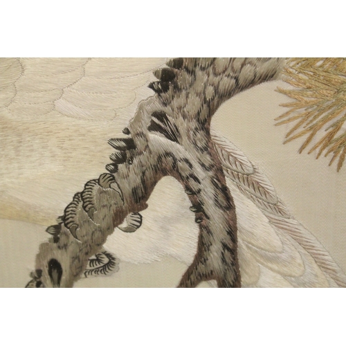 89 - A VERY FINE AND LARGE ORIENTAL SILK WORK PICTURE, with embroidered silk wool bird on a branch, beari... 