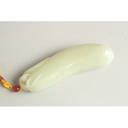 97 - A CHINESE CELADON JADE CARVING OF A CUCUMBER, 13.5cm long.