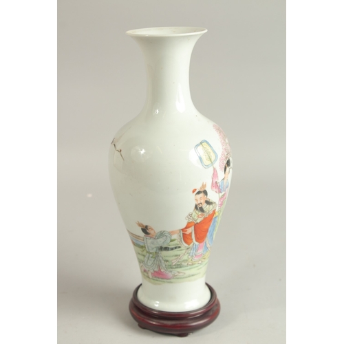 99 - A CHINESE FAMILLE ROSE PORCELAIN VASE, on hardwood stand, the vase painted with figures, the base wi... 