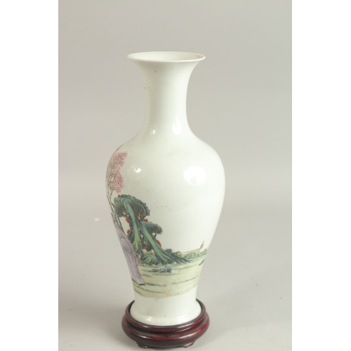 99 - A CHINESE FAMILLE ROSE PORCELAIN VASE, on hardwood stand, the vase painted with figures, the base wi... 