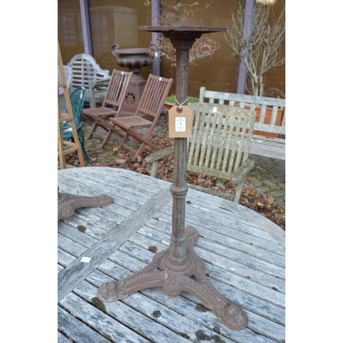 1 - A pair of cast iron stands.