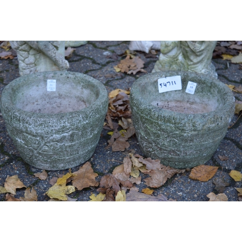 10 - A pair of small reconstituted stone pots.